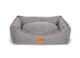 The Kensington nest bed from the front with reversible cushion showing